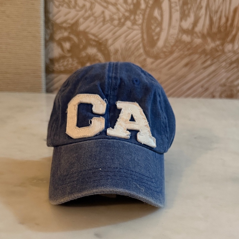 Blue Cap with White 'CA' Letters